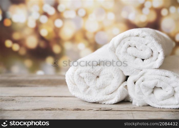 front view stacked towels with bokeh background