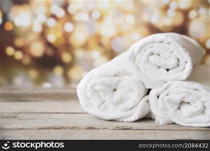 front view stacked towels with bokeh background