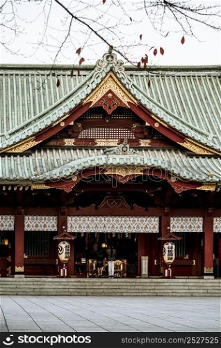 front view traditional japanese wooden temple with roof lanterns