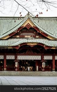 front view traditional japanese wooden temple with roof lanterns