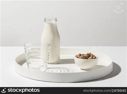 front view tray with milk bottle walnuts