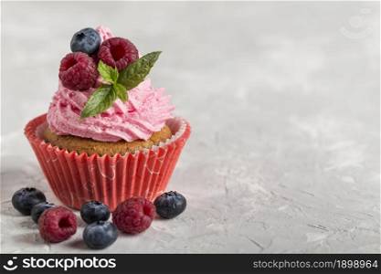 front view view tasty cupcake with strawberry cream. Resolution and high quality beautiful photo. front view view tasty cupcake with strawberry cream. High quality beautiful photo concept