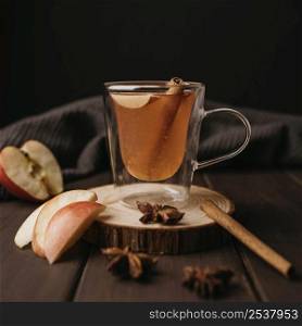 front view winter hot drink glass with apple cinnamon