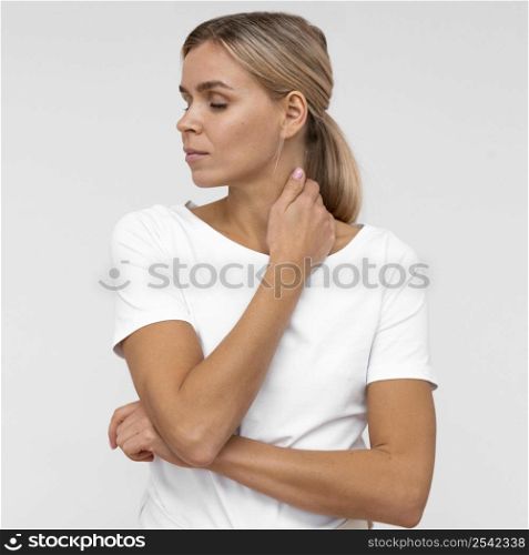 front view woman bothered by neck pain