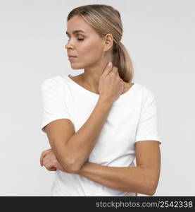 front view woman bothered by neck pain