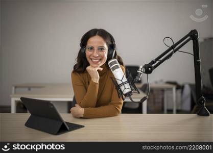 front view woman broadcasting radio