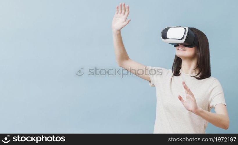 front view woman experiencing virtual reality. High resolution photo. front view woman experiencing virtual reality. High quality photo