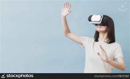 front view woman experiencing virtual reality. High resolution photo. front view woman experiencing virtual reality. High quality photo