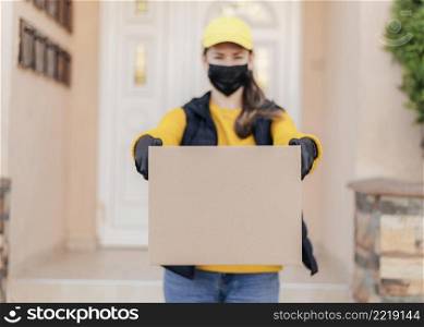 front view woman holding box