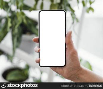 front view woman holding smartphone with copy space. Resolution and high quality beautiful photo. front view woman holding smartphone with copy space. High quality beautiful photo concept