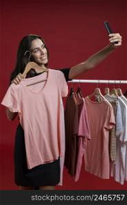front view woman taking selfie with pink t shirt