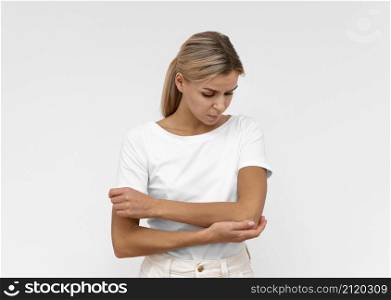 front view woman with elbow pain