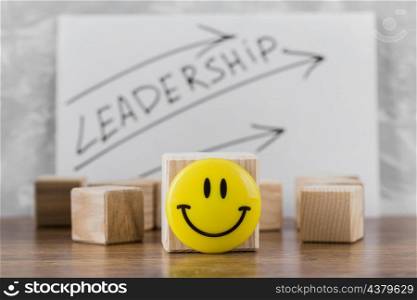 front view wooden blocks with leadership