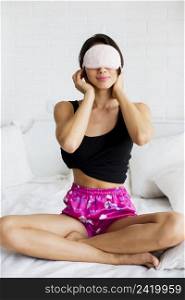 front view young woman with sleeping mask