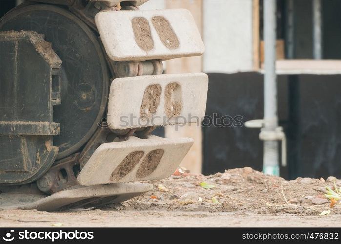 Front wheel of an excavator on the construction site