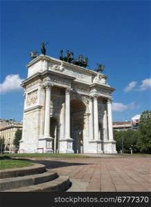 Frontal facade view of Arco della Pace (Arch Of Peace) in a beautiful day with blue sky, Milan, Lombardy, Italy, Europe.