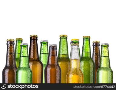 Frosty bottles of beer isolated on a white background