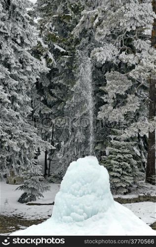 Frozen fountain in mountain in winter,Rila mountain, Borovetz