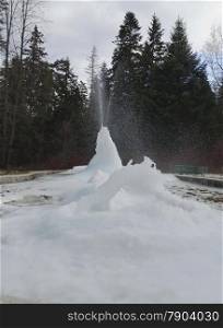 Frozen fountain in mountain in winter, Rila mountain, Borovetz, Bulgaria