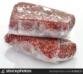 frozen ground meat in plastic package, close up