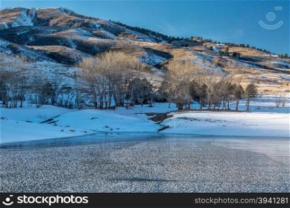 frozen Horsetooth Reservoir and Lory State Park at winter sunset, Fort COllins, COlorado