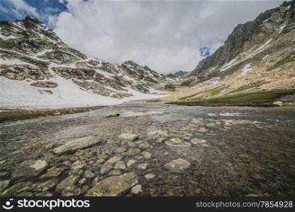 Frozen lake with mountain
