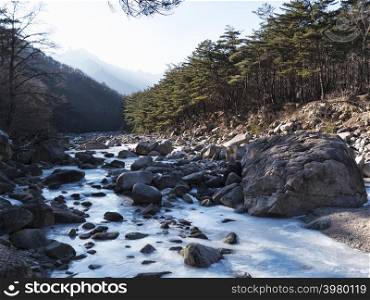 Frozen mountain river in Seoraksan National Park, South Korea