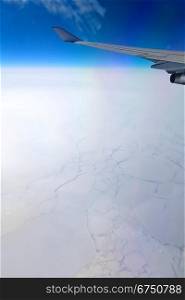 Frozen ocean, aerial view from illuminator of flying aircraft