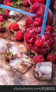 Frozen raspberry juice. Close up of frozen raspberry juice with ice