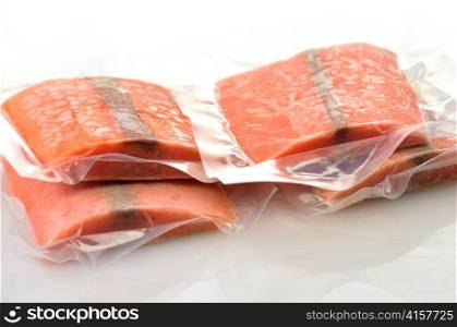 frozen salmon fillets in a vacuum package