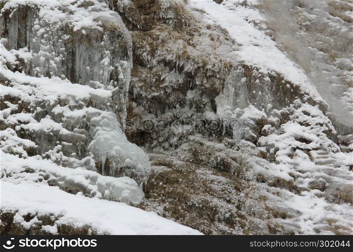 Frozen waterfal in cold winter