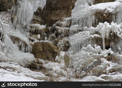 Frozen waterfal in cold winter