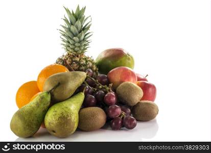 fruit as oranges pineapple grapes apple pear mango and kiwi isolated on white