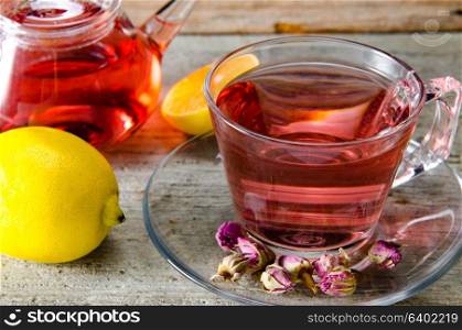 Fruit berry tea in the cup served on table