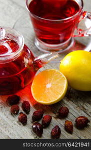 Fruit berry tea in the cup served on table