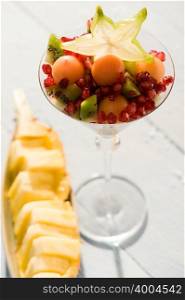 Fruit cocktail and a pineapple dish