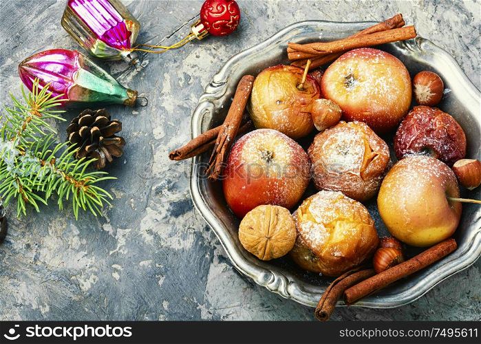 Fruit dessert baked red apples.Christmas food and xmas decoration. Red baked apples