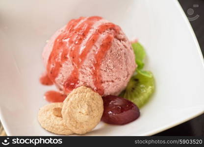 Fruit ice cream. Fruit strawberry ice cream in plate