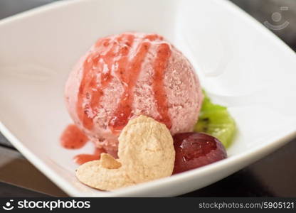 Fruit ice cream. Fruit strawberry ice cream in plate