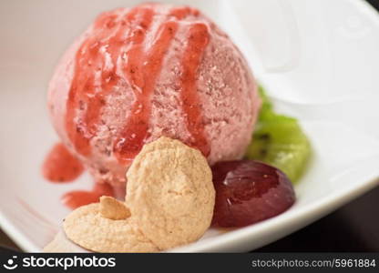 Fruit ice cream. Fruit strawberry ice cream in plate