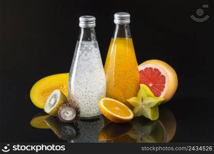 fruit juices composition black background