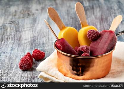 Fruit popsicles ice cream on a plate.