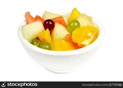Fruit salad in a bowl on a white background.