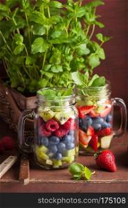 fruit salad in mason jar strawberry blueberry kiwi apple mint