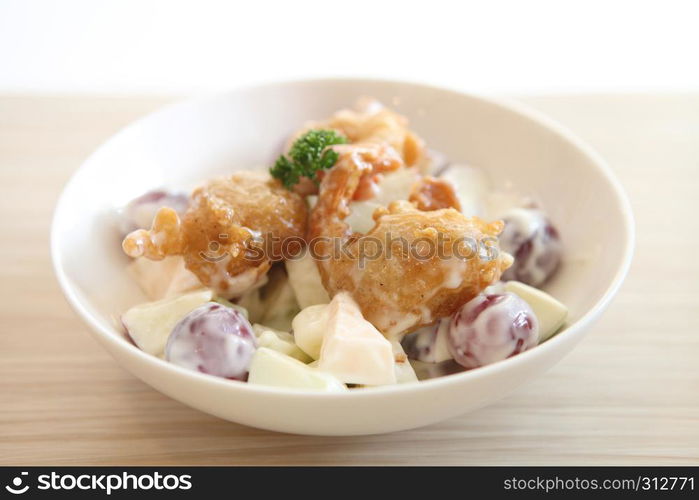 fruit salad on wood background