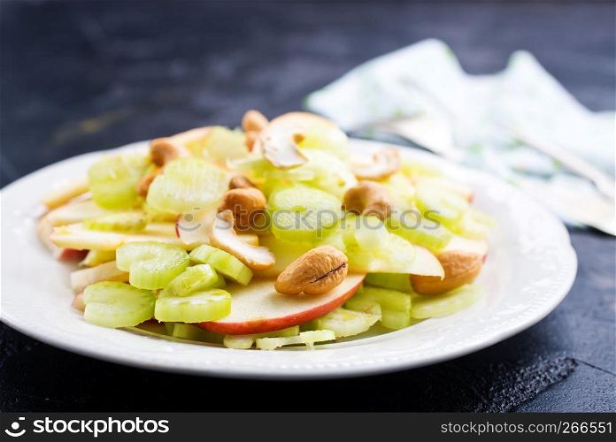 fruit salad with nuts on the plate