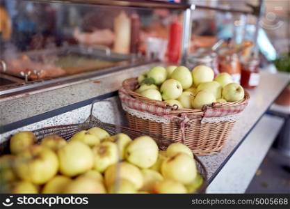 fruit, sale and food concept - apples in baskets at street market. apples in baskets at street market