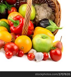 fruits and vegetables in a basket isolated on white background