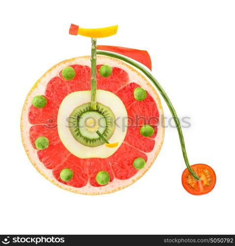 Fruits and vegetables in the shape of a vintage penny-farthing bicycle.