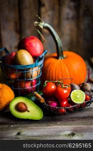 Fruits and vegetables on wooden background